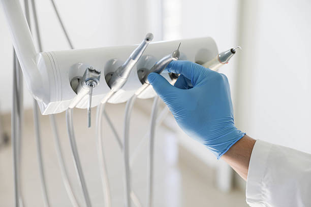 Professional Tooth Extraction technician working in St. Cloud, FL